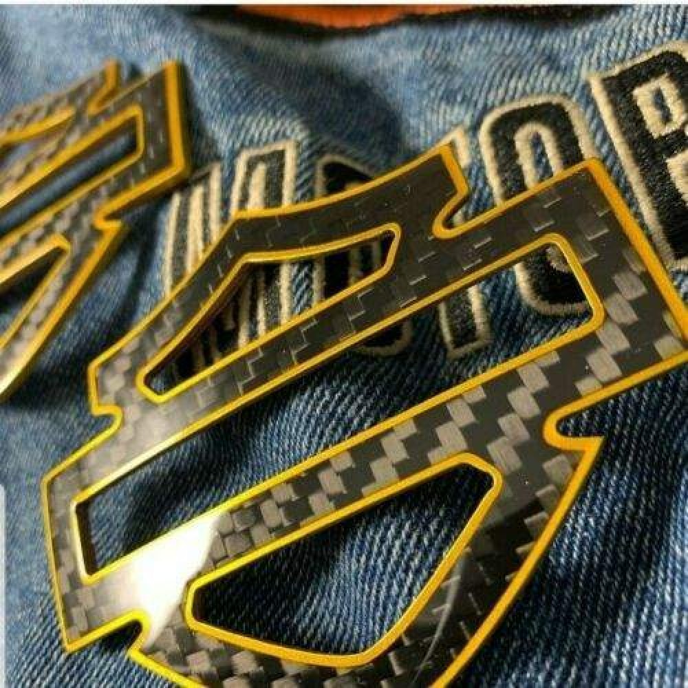 Black carbon with gold front outline tank emblems for Harley