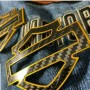 Black carbon with gold front outline tank emblems for Harley