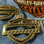 Black carbon with gold front outline tank emblems for Harley