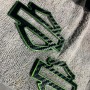 Black carbon with green front outline tank emblems for Harley