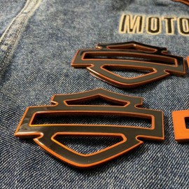 Black with orange front outline tank emblems for Harley
