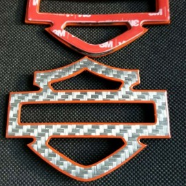 Silver carbon with orange front outline tank emblems for Harley