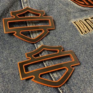 Black with orange front outline tank emblems for Harley