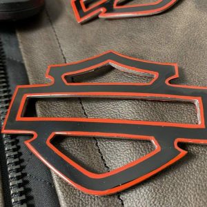 Black with red front outline tank emblems for Harley