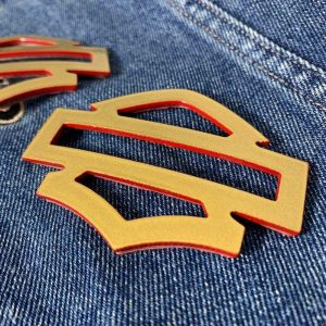 Gold with red edges tank emblems for Harley